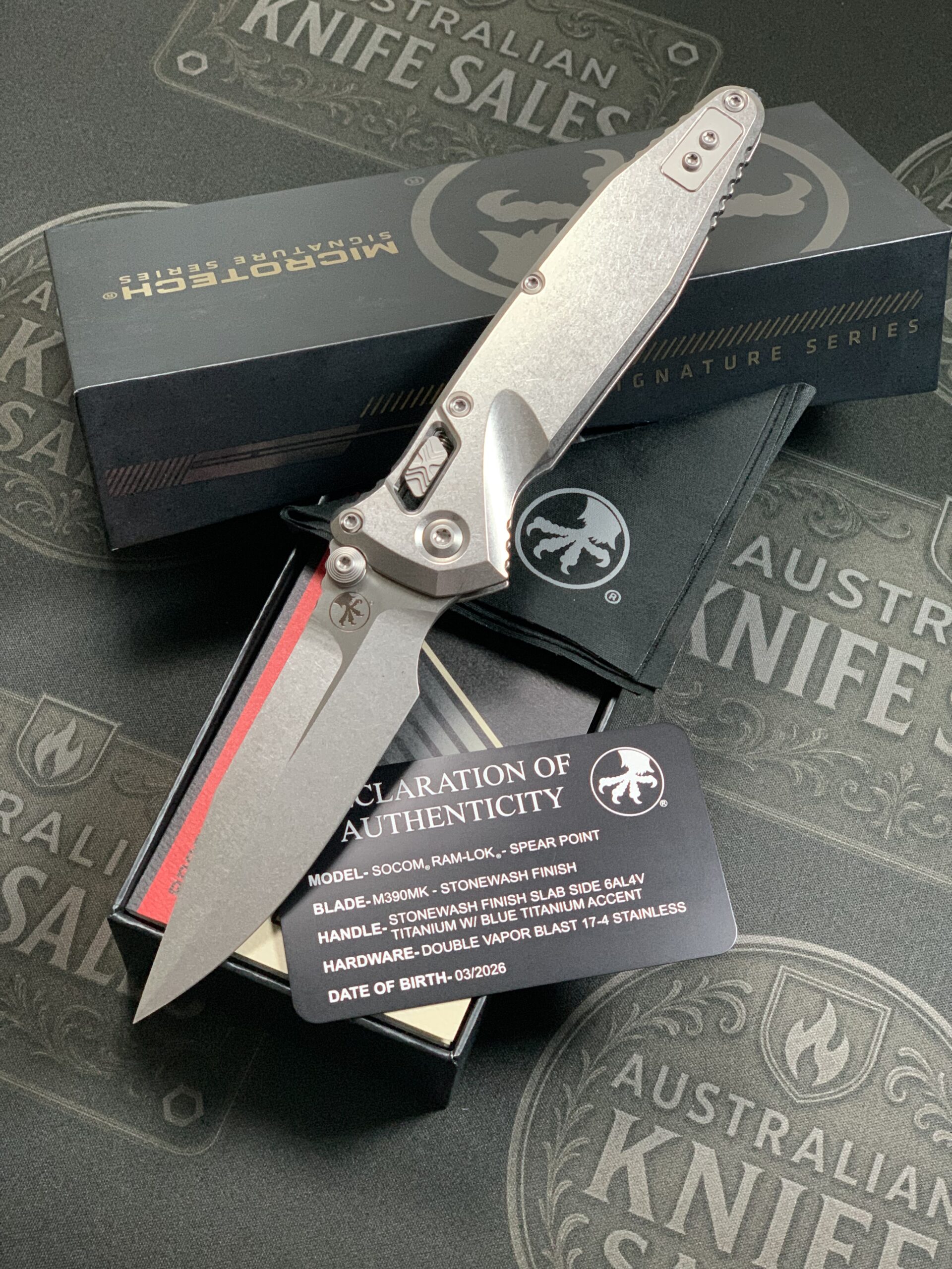 Microtech Marfione Select Socom Ram-Lok Spearpoint – Slab Side Titanium Handles Stonewash w/ Blue Titanium Accents