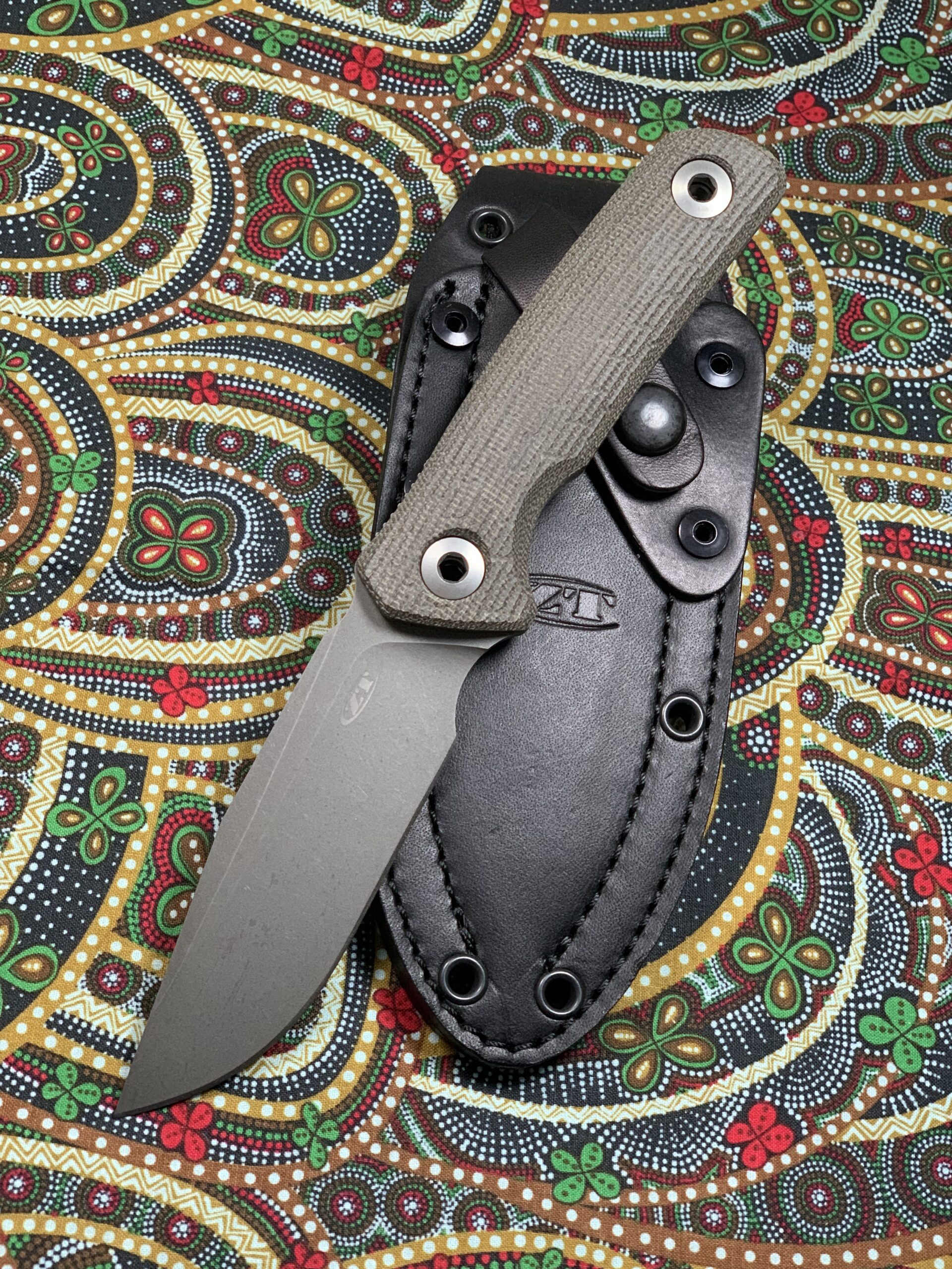 ZT0004OL CPM-CruWear Stonewash Clip Point Blade & Olive Drab Canvas Micarta Handles